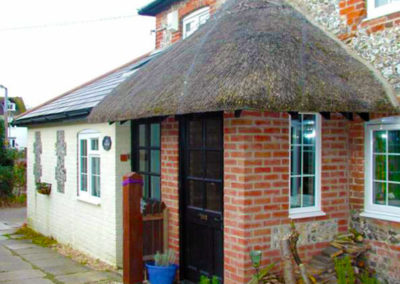 Extension and thatched roof work